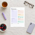 Daily Brain Dump Planner printed page on a desk